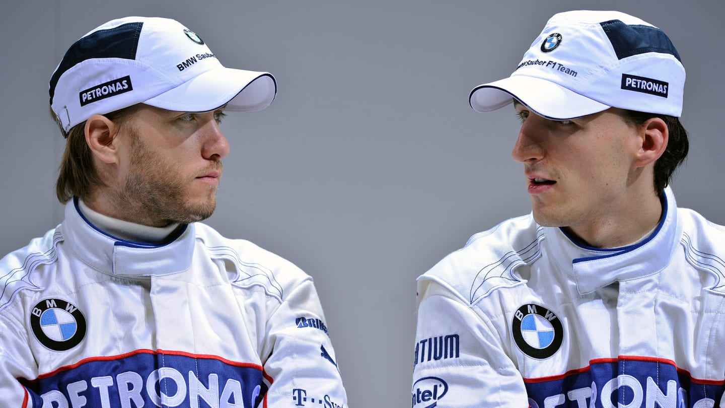 VALENCIA, SPAIN - JANUARY 20: BMW Sauber drivers Nick Heidfeld (R) of Germany and Robert Kubica of