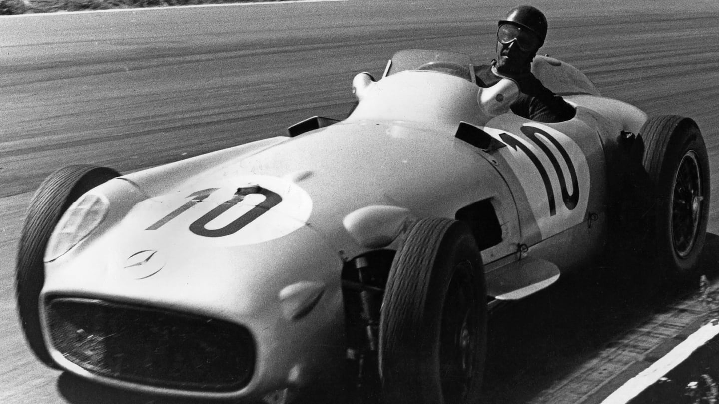 Juan Manuel Fangio, Mercedes W196, Grand Prix of Great Britain, Aintree, 16 July 1955. (Photo by