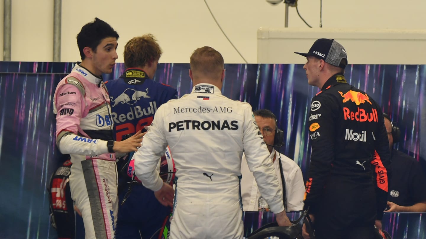 Max Verstappen, Red Bull Racing and Esteban Ocon, Racing Point Force India square up after the race following their on track crash during the Brazilian GP on November 11, 2018 in Autodromo Jose Carlos Pace, Brazil. (Photo by Sutton Images)