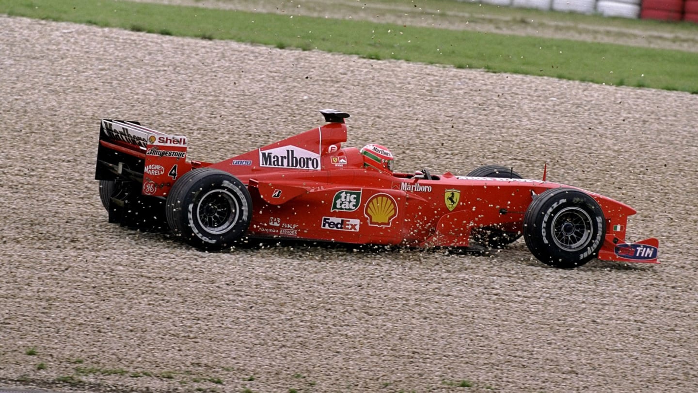26 Sep 1999: Eddie Irvine of Great Britain slides the Ferrari off the track during the European