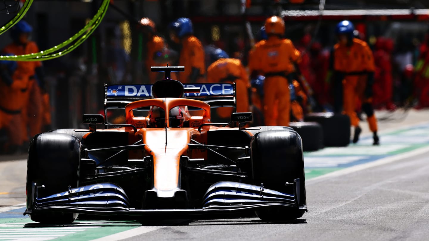 NORTHAMPTON, ENGLAND - AUGUST 02: Carlos Sainz of Spain driving the (55) McLaren F1 Team MCL35