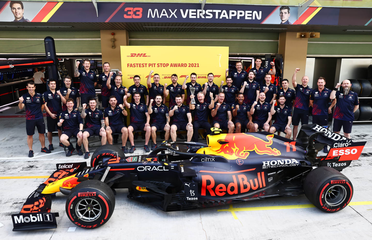 ABU DHABI, UNITED ARAB EMIRATES - DECEMBER 12: The Red Bull Racing team celebrate being awarded the