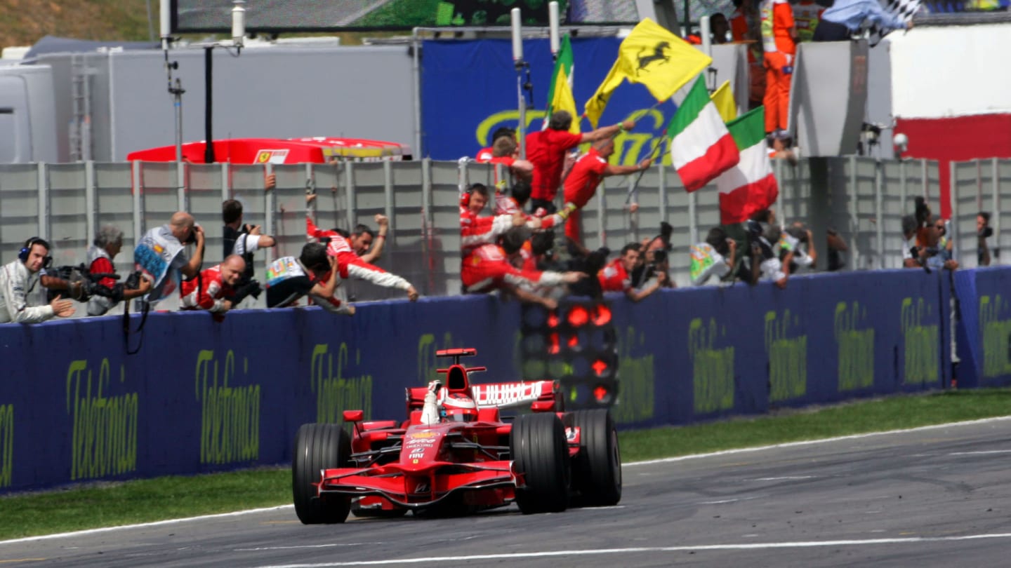 Race winner Kimi Raikkonen (FIN) Ferrari crosses the line to win the race. 
Formula One World