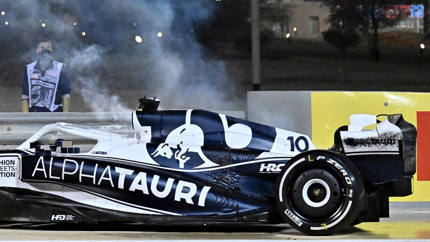 Smoke billows from AlphaTauri's French driver Pierre Gasly's car after it caught fire during the Bahrain Formula One Grand Prix at the Bahrain International Circuit in the city of Sakhir on March 20, 2022. (Photo by Mazen MAHDI / AFP) (Photo by MAZEN MAHDI/AFP via Getty Images)