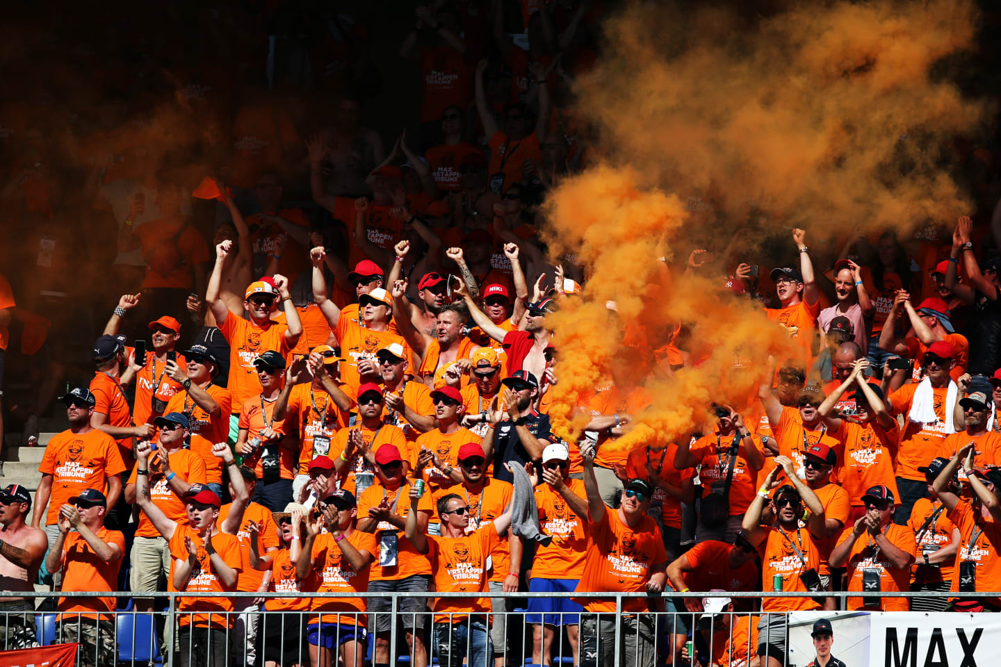 SPIELBERG, AUSTRIA - JUNE 30: Max Verstappen of Netherlands and Red Bull Racing fans celebrate