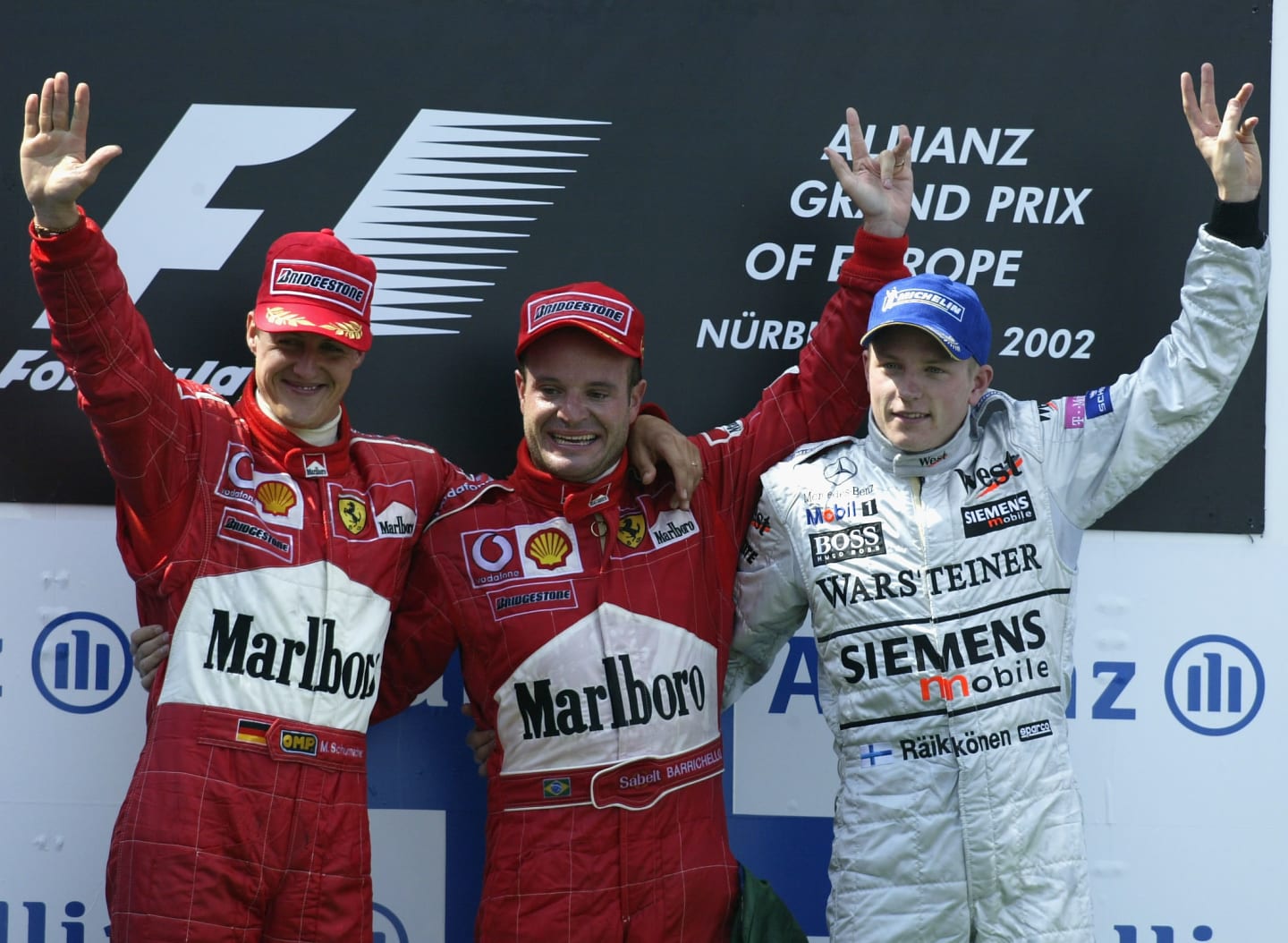NURBURGRING - JUNE 23:  Rubens Barrichello of Brazil and Ferrari celebrates with 2nd placed team