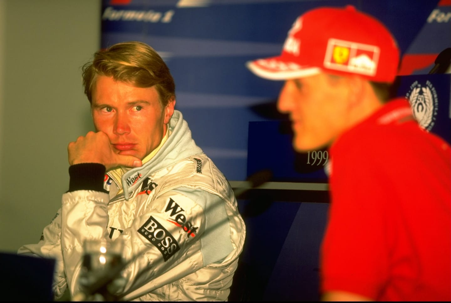 4 Mar 1999:  McLaren Mercedes driver Mika Hakkinen eyes up championship rival Michael Schumacher at