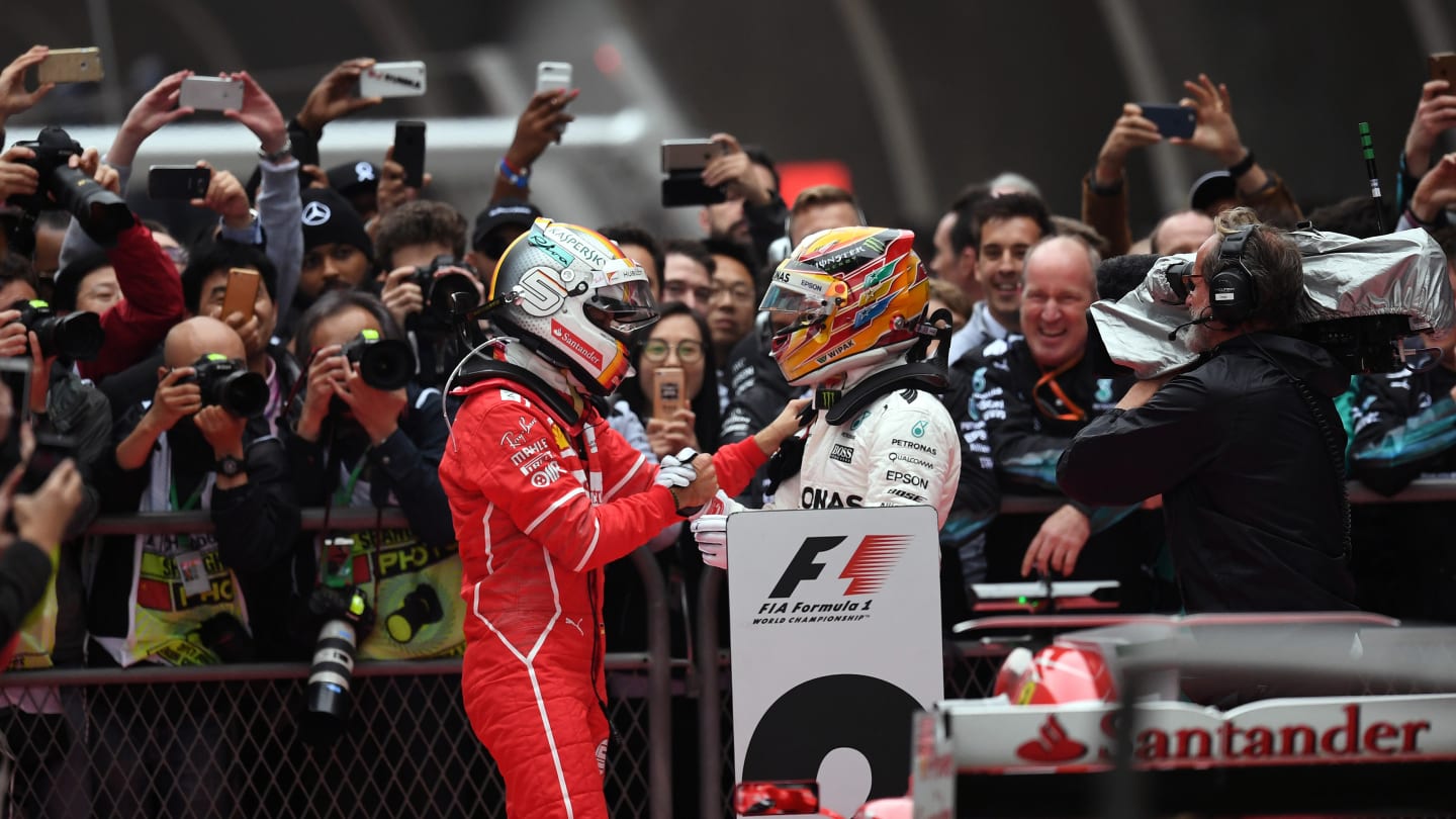 www.sutton-images.com

Race winner Lewis Hamilton (GBR) Mercedes AMG F1 and Sebastian Vettel (GER)