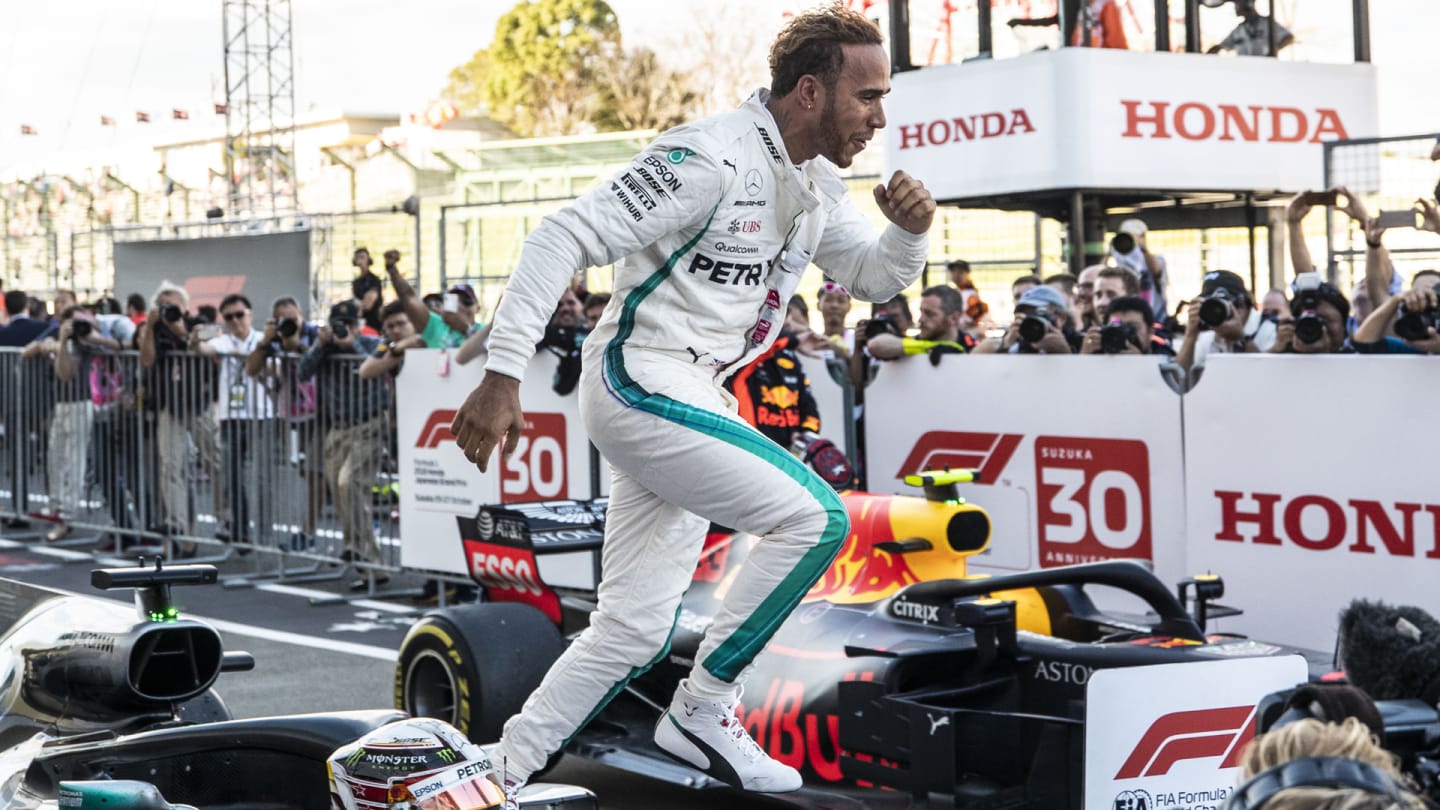 SUZUKA, JAPAN - OCTOBER 07: Lewis Hamilton, Mercedes AMG F1 celebrates in parc ferme during the
