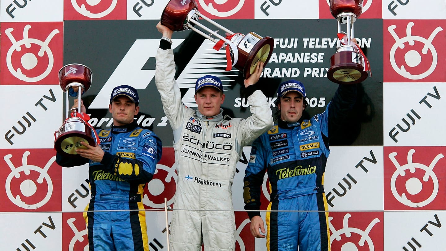 SUZUKA, JAPAN - OCTOBER 09: Kimi Raikkonen of Finland and McLaren Mercedes celebrates winning the
