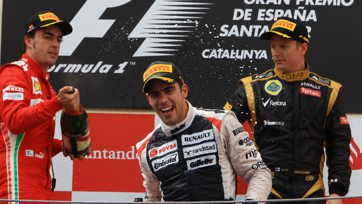 Podium (L to R): Second placed Fernando Alonso (ESP) Ferrari, race winner Pastor Maldonado (VEN)