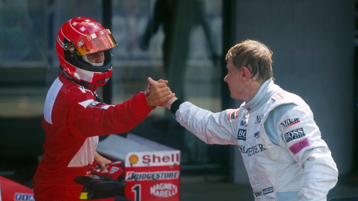 L-R: Michael Schumacher(D) Ferrari F1 2001, Mika Hakkinen(FIN) McLaren Mercedes MP4/16
British