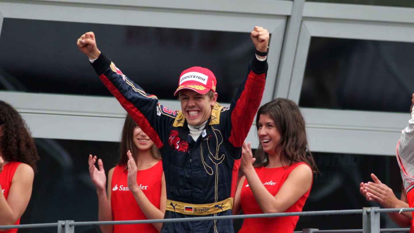 Sebastian Vettel (GER) Scuderia Toro Rosso celebrates on the podium 
Formula One World