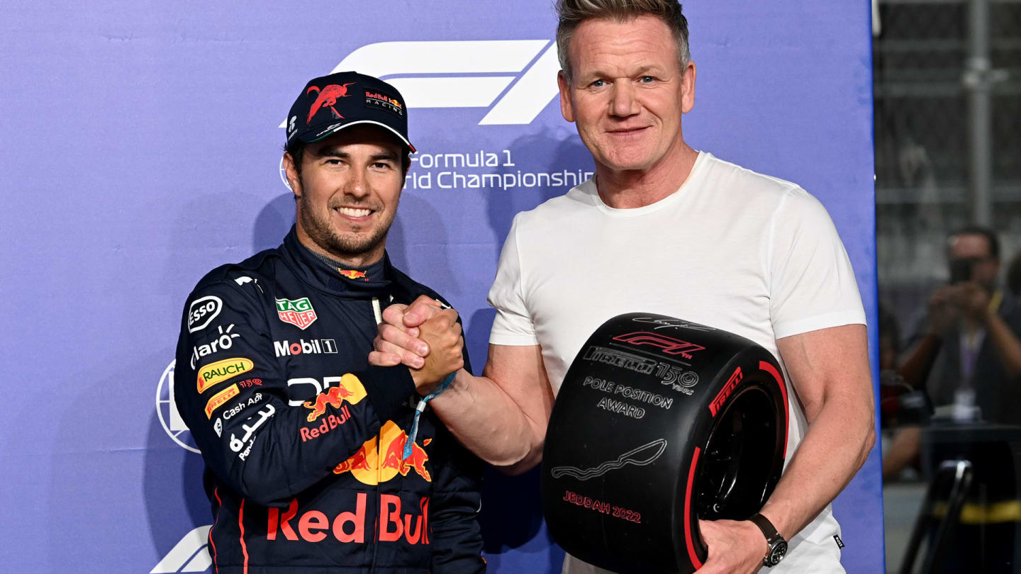 JEDDAH STREET CIRCUIT, SAUDI ARABIA - MARCH 26: Sergio Perez, Red Bull Racing, receives the Pirelli