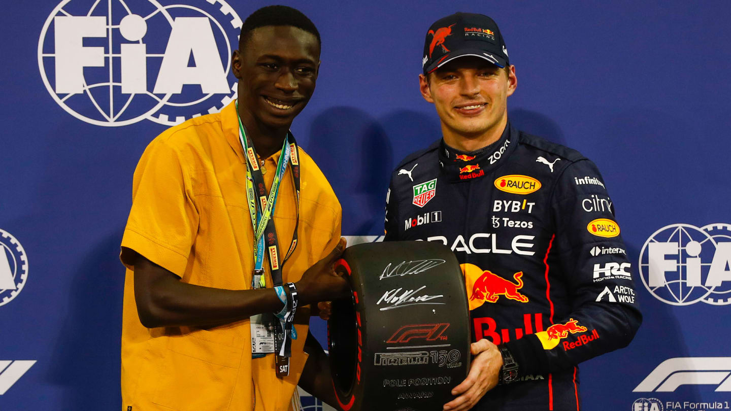 YAS MARINA CIRCUIT, UNITED ARAB EMIRATES - NOVEMBER 19: Max Verstappen, Red Bull Racing, receives