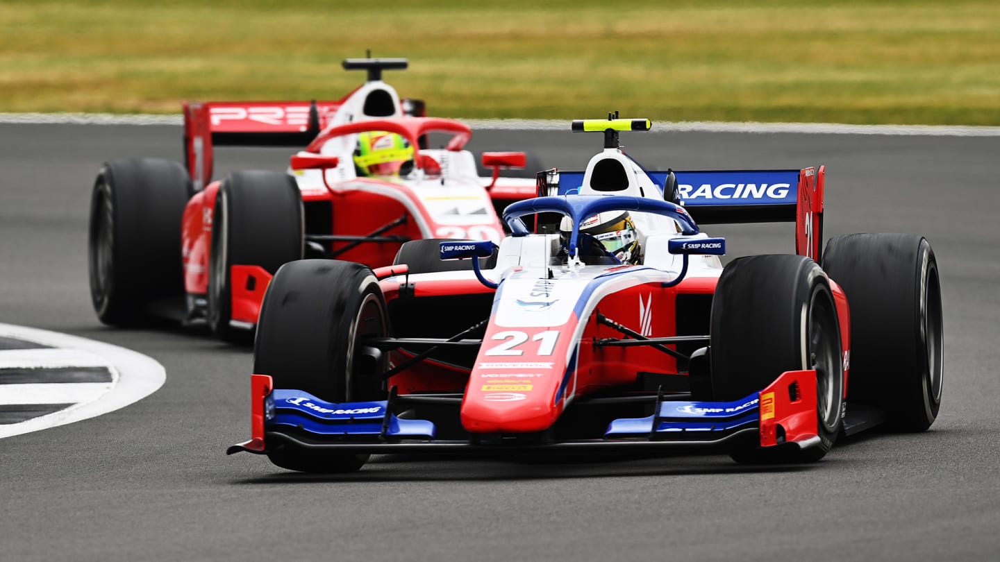 NORTHAMPTON, ENGLAND - AUGUST 09: Robert Shwartzman of Russia and Prema Racing (21) leads Mick