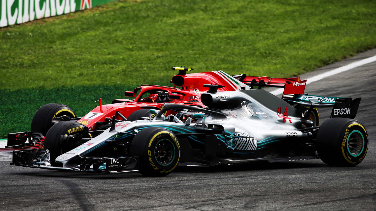 Kimi Raikkonen (FIN) Ferrari SF71H and Lewis Hamilton (GBR) Mercedes AMG F1 W09 battle for the lead
