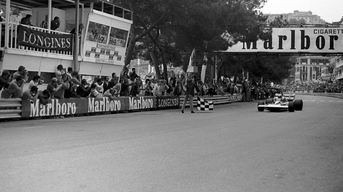 Jackie Stewart(GBR) Tyrrell 003, takes the flag to win. He led from  start to finish
Monaco GP, 23