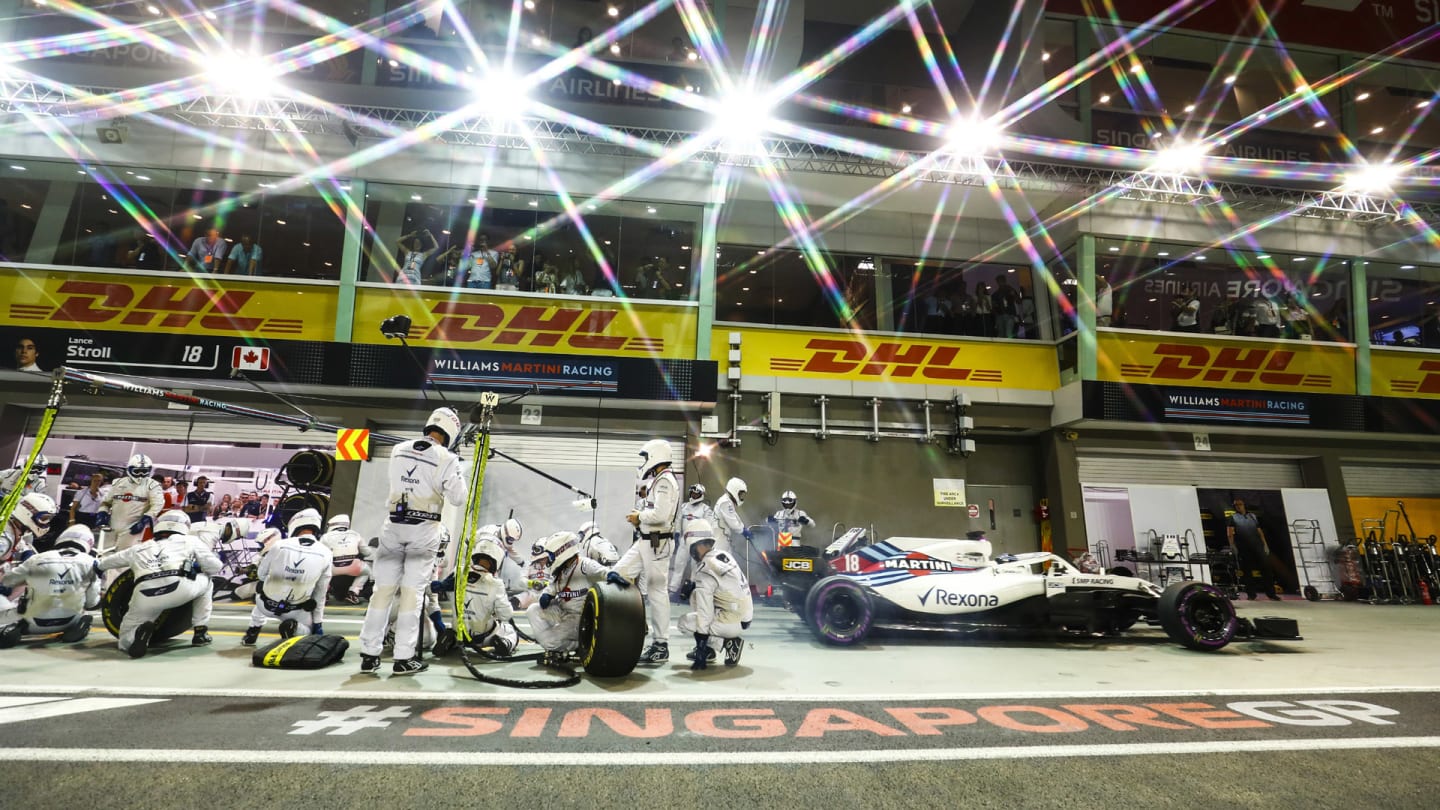 SINGAPORE STREET CIRCUIT, SINGAPORE - SEPTEMBER 16: Lance Stroll, Williams FW41, leaves his pit box after a stop during the Singapore GP at Singapore Street Circuit on September 16, 2018 in Singapore Street Circuit, Singapore. (Photo by Sam Bloxham / LAT Images)