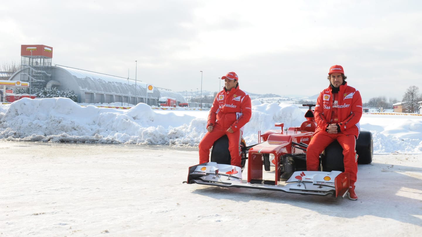 Ferrari showed off their 2012 challenger at a snowy Maranello in February 2012 – and don’t Fernando Alonso and Felipe Massa look happy about it! © Copyright Free for Editorial Use Only