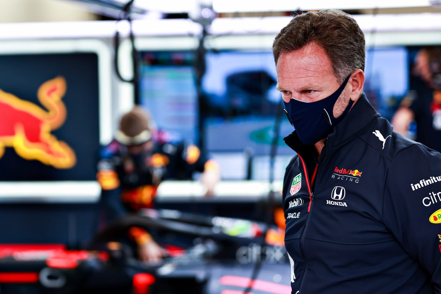 BARCELONA, SPAIN - MAY 09: Red Bull Racing Team Principal Christian Horner looks on in the garage