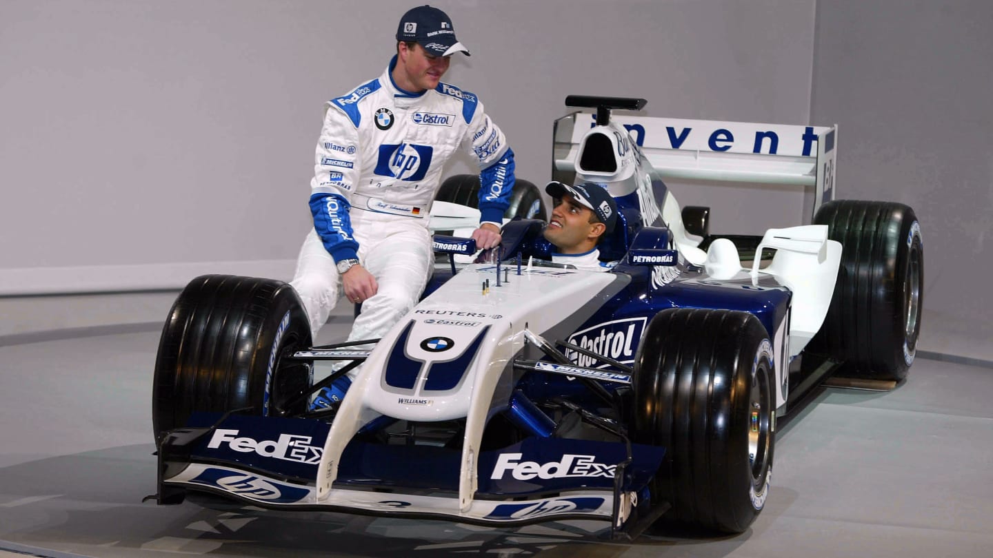 (L to R): Ralf Schumacher (GER) Williams and Juan Pablo Montoya (COL) Williams with the new Williams BMW FW26. Valencia, Spain, 5 January 2004. © Sutton Motorsport Images