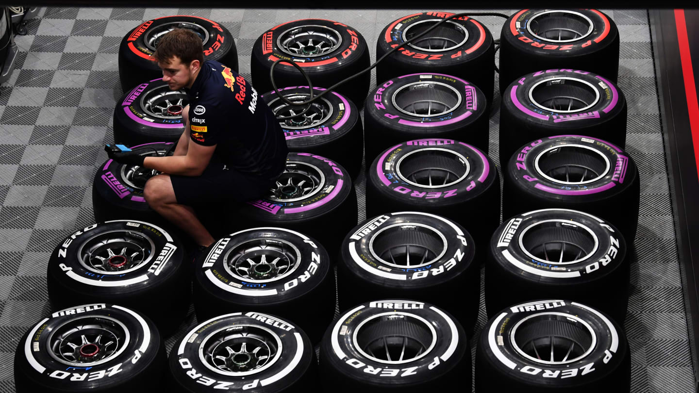 Red Bull Racing mechanic and Pirelli tyres at Formula One Testing, Day Two, Barcelona, Spain, 7 
