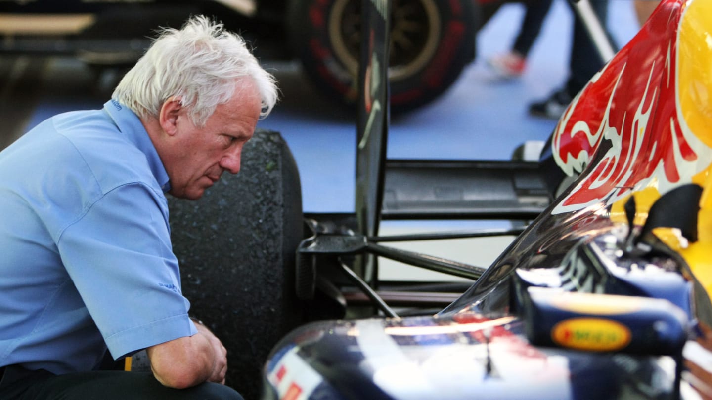 Charlie Whiting (GBR) FIA Delegate looks at the Red Bull Racing RB7.
Formula One World