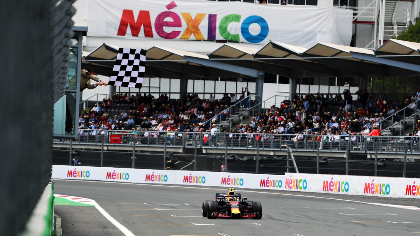AUTODROMO HERMANOS RODRIGUEZ, MEXICO - OCTOBER 28: Race Winner Max Verstappen, Red Bull Racing RB14 crosses the line during the Mexican GP at Autodromo Hermanos Rodriguez on October 28, 2018 in Autodromo Hermanos Rodriguez, Mexico. (Photo by Simon Galloway / Sutton Images)