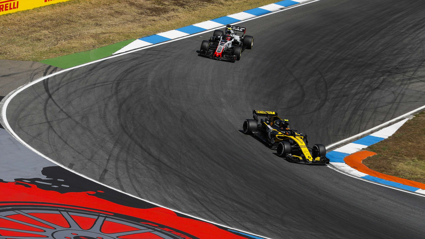 HOCKENHEIMRING, GERMANY - JULY 20: Carlos Sainz Jr., Renault Sport F1 Team R.S. 18, leads Kevin