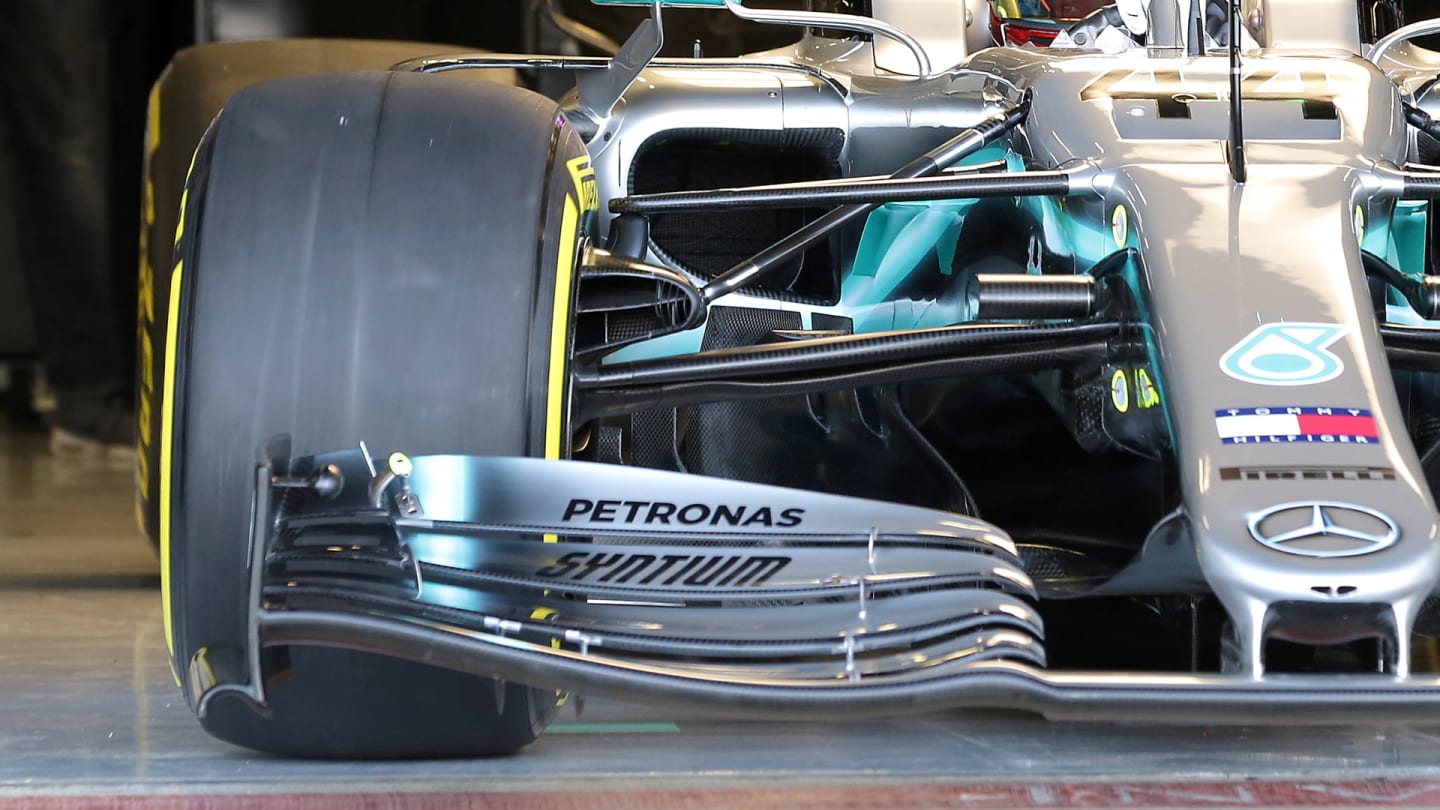 ... and last year's Mercedes W10, when the car first hit the track at its shakedown