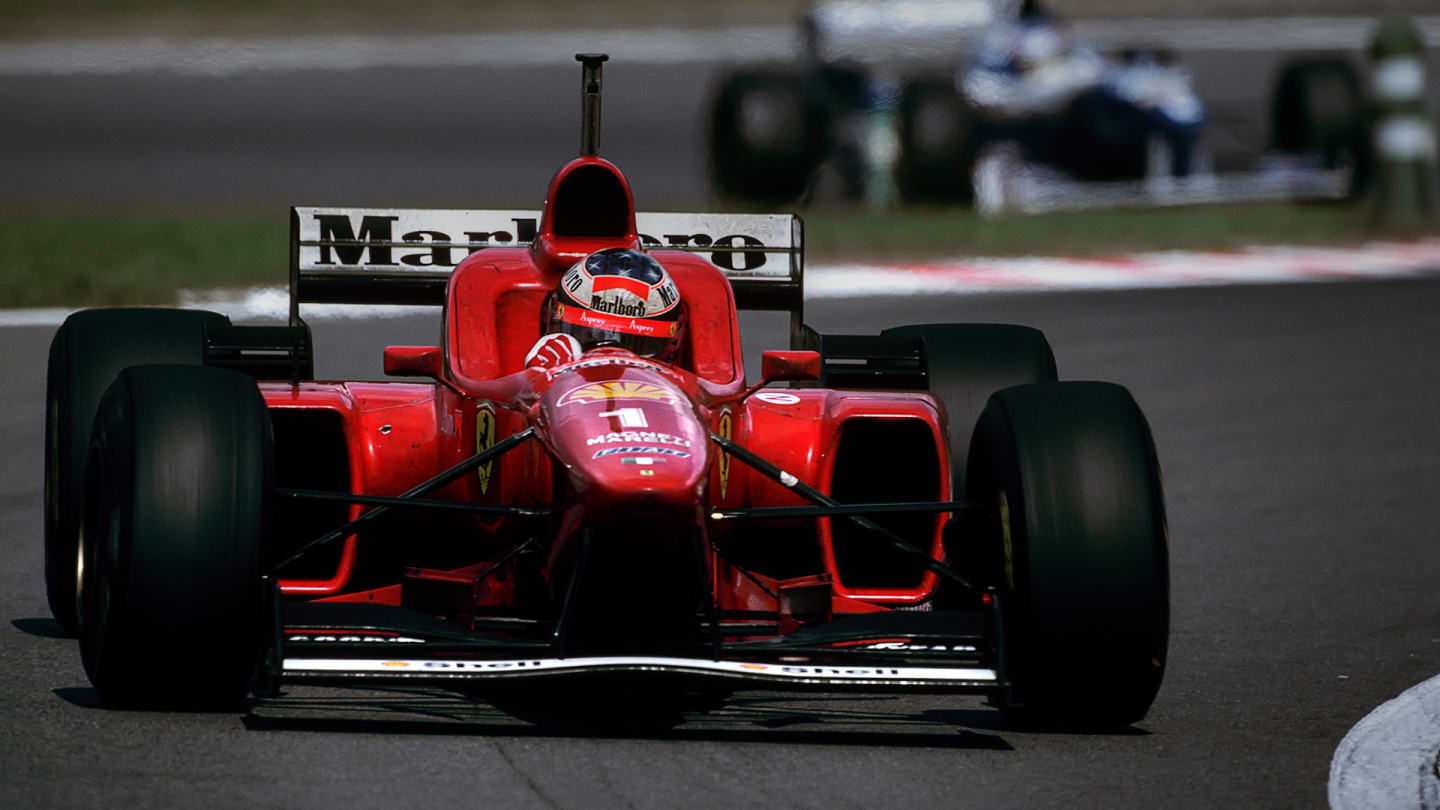 Michael Schumacher, Jacques Villeneuve, Ferrari F310, Williams-Renault FW18, Grand Prix of Italy,