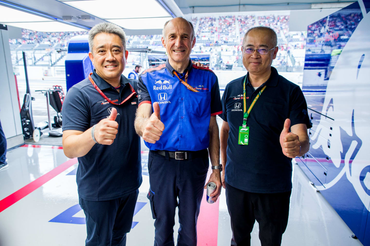 SUZUKA, JAPAN - OCTOBER 06:  Masashi Yamamoto of Honda and Japan with Franz Tost of Scuderia Toro