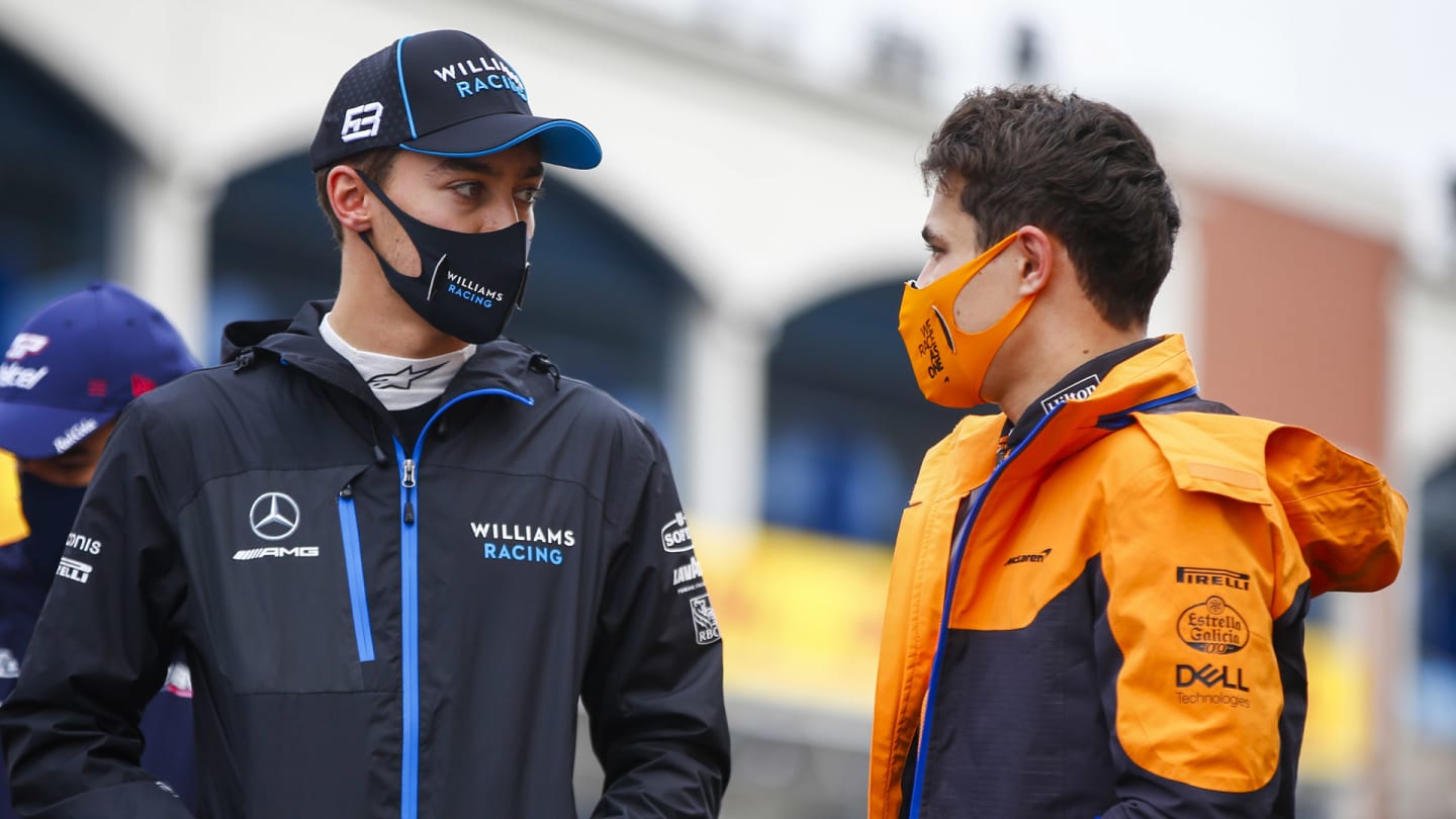 George Russell, Williams Racing, and Lando Norris, McLaren, oon the