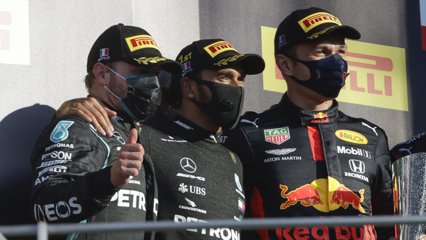 Mercedes driver Valtteri Bottas of Finland, center, winner of the Formula One Grand Prix of