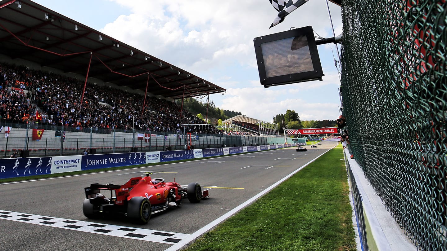 Race winner Charles Leclerc (MON) Ferrari SF90 takes the chequered flag at the end of the