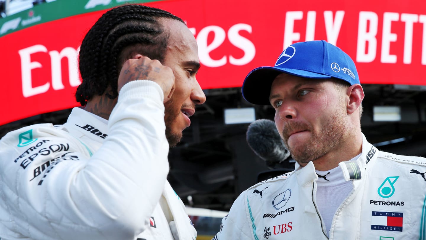 (L to R): Lewis Hamilton (GBR) Mercedes AMG F1 with Valtteri Bottas (FIN) Mercedes AMG F1 in