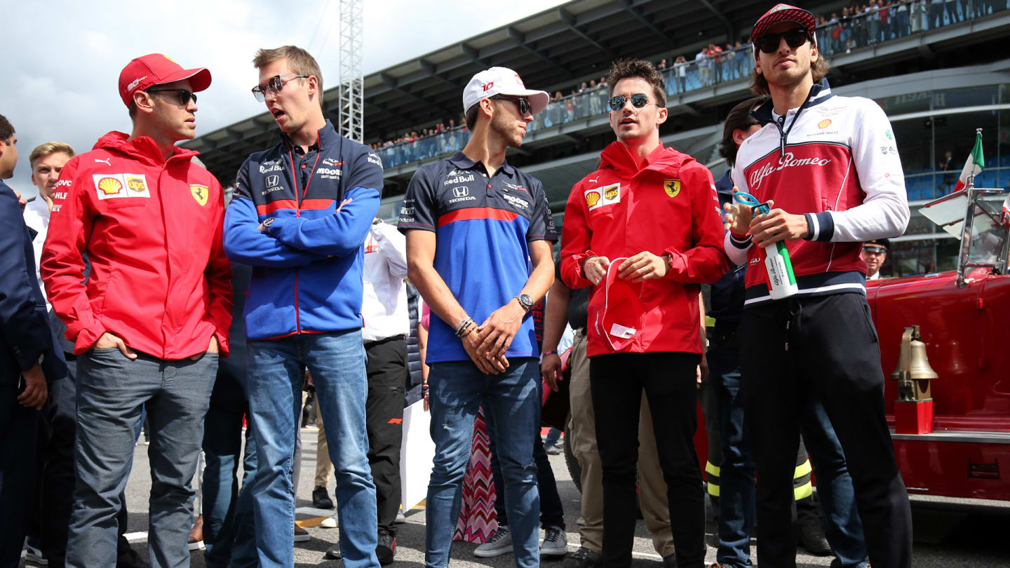 (L to R): Sebastian Vettel (GER) Ferrari; Daniil Kvyat (RUS) Scuderia Toro Rosso; Pierre Gasly