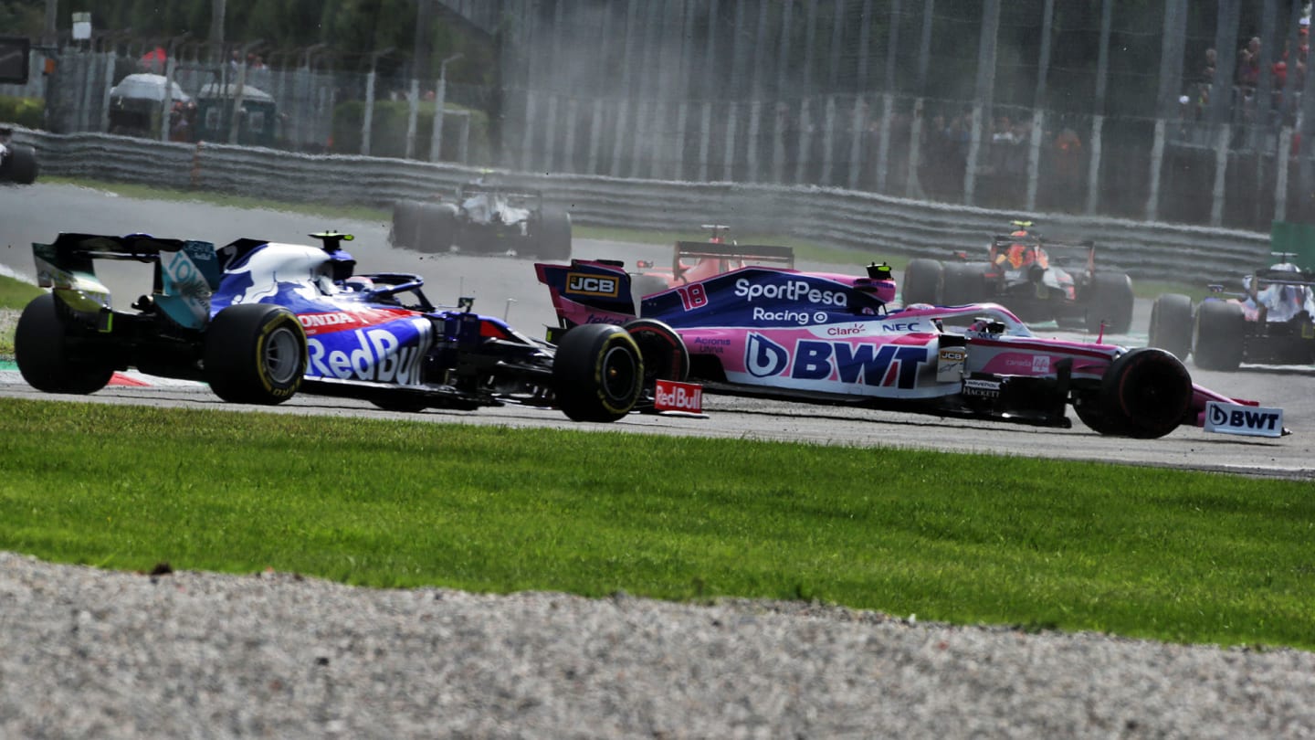 Lance Stroll (CDN) Racing Point F1 Team RP19 returns to the circuit ahead of Pierre Gasly (FRA)