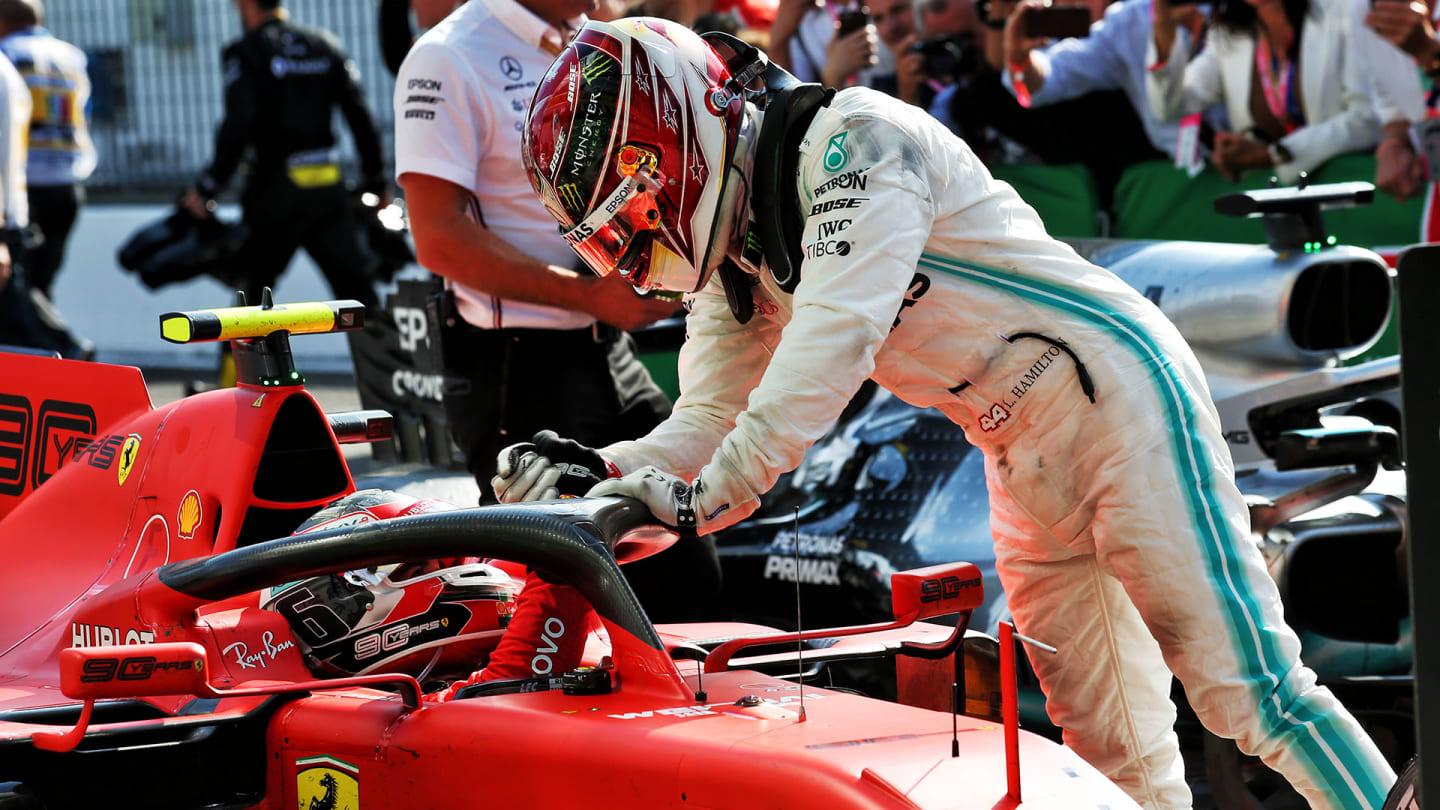 Race winner Charles Leclerc (MON) Ferrari SF90 is congratulated in parc ferme by third placed Lewis