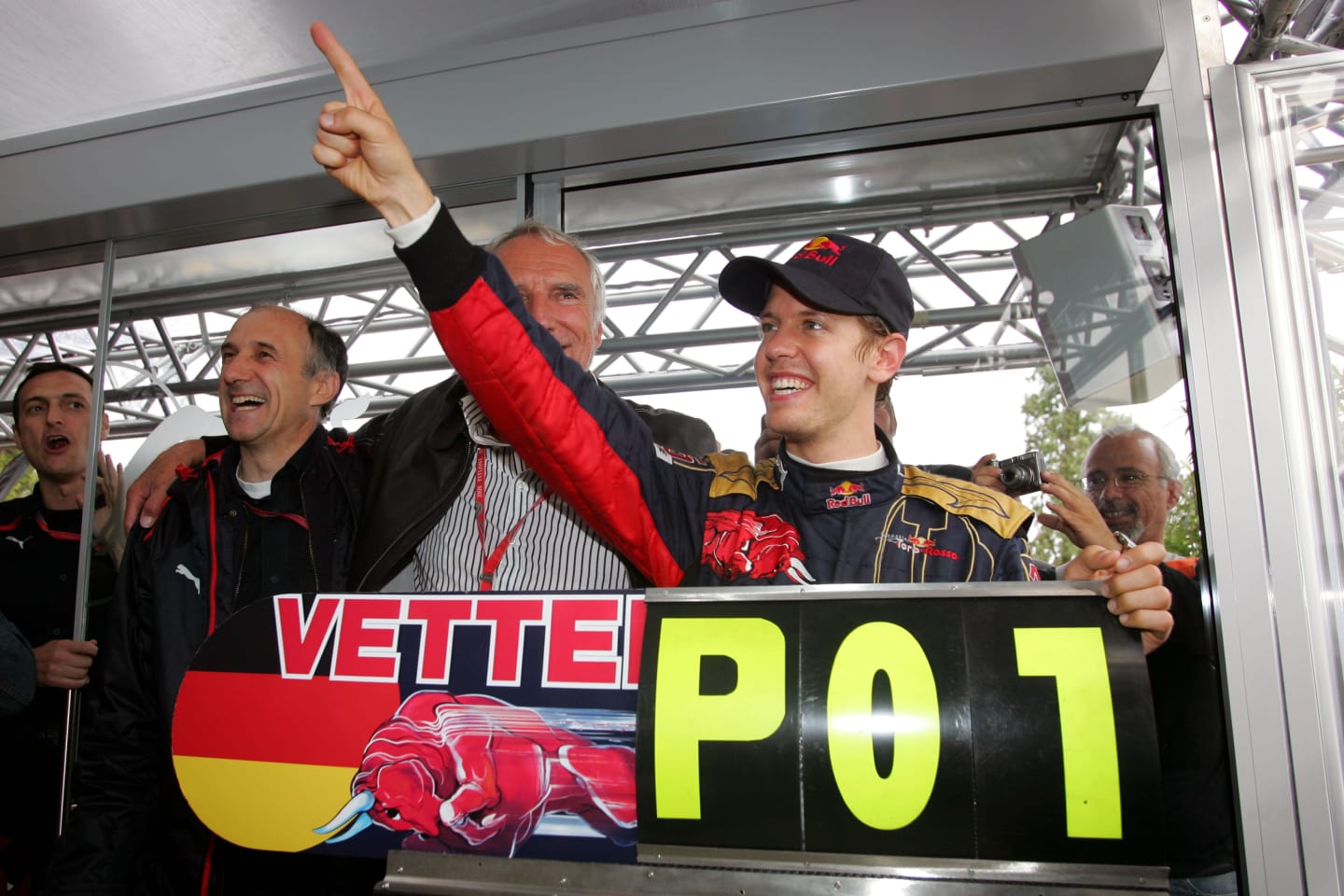Sebastian Vettel (GER) Scuderia Toro Rosso celebrates victory with Franz Tost (AUT) Scuderia Toro