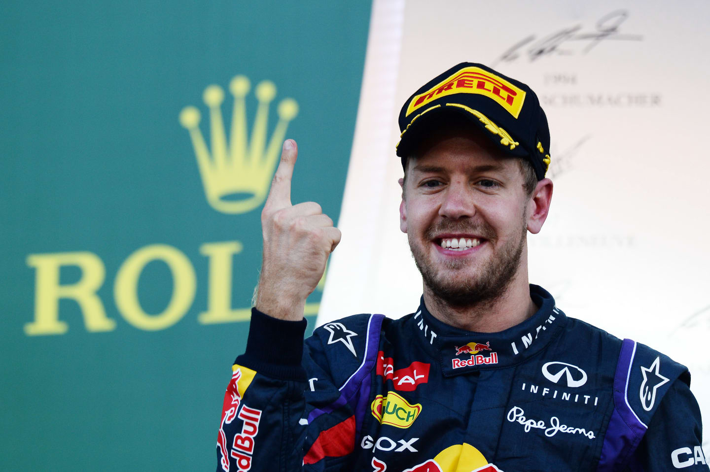 Race winner Sebastian Vettel (GER) Red Bull Racing celebrates on the podium.
Formula One World