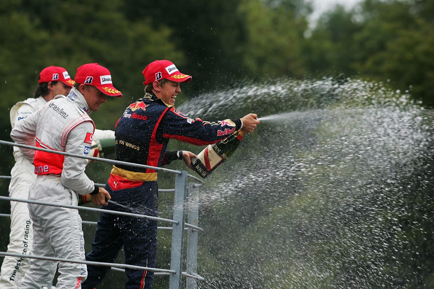 Robert Kubica (POL) BMW Sauber F1, Heikki Kovalainen (FIN) McLaren and Sebastian Vettel (GER)