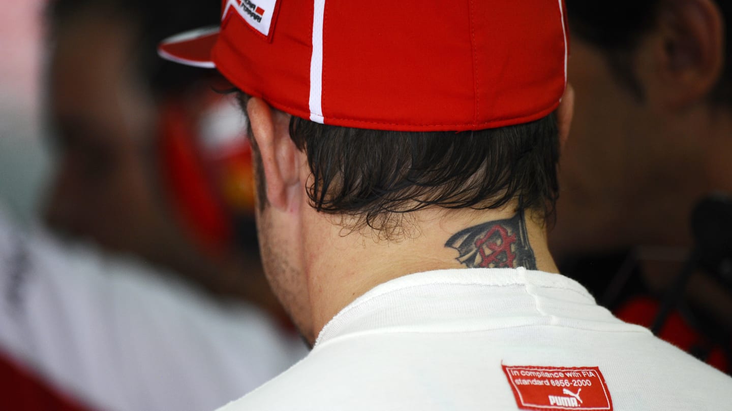 Fernando Alonso (ESP) Ferrari and tattoo.
Formula One World Championship, Rd2, Malaysian Grand
