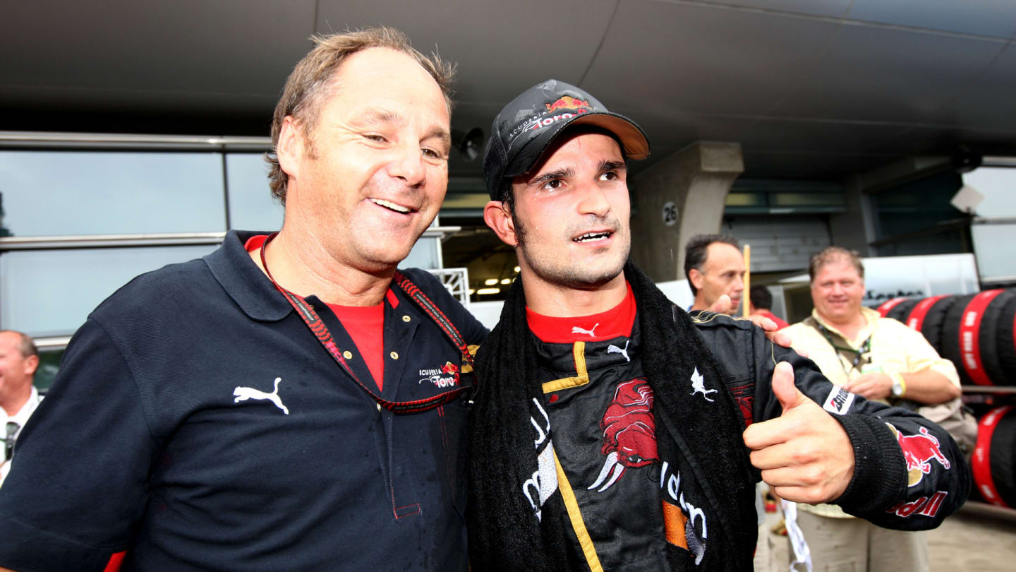 Vitantonio Liuzzi (ITA) Scuderia Toro Rosso with Gerhard Berger (AUT) Scuderia Toro Rosso Team Part