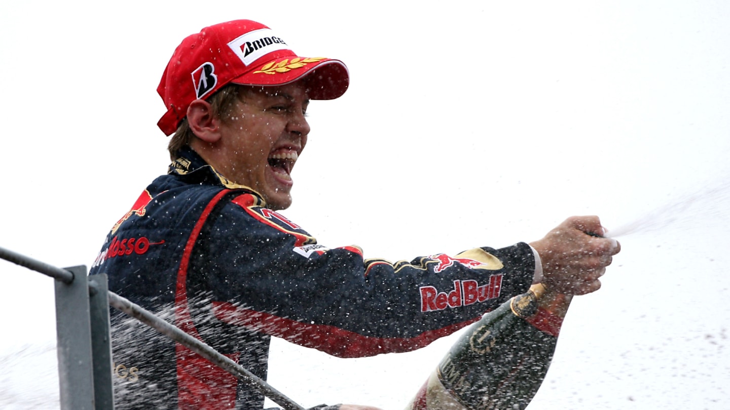 Race winner Sebastian Vettel (GER) Scuderia Toro Rosso on the podium.
Formula One World