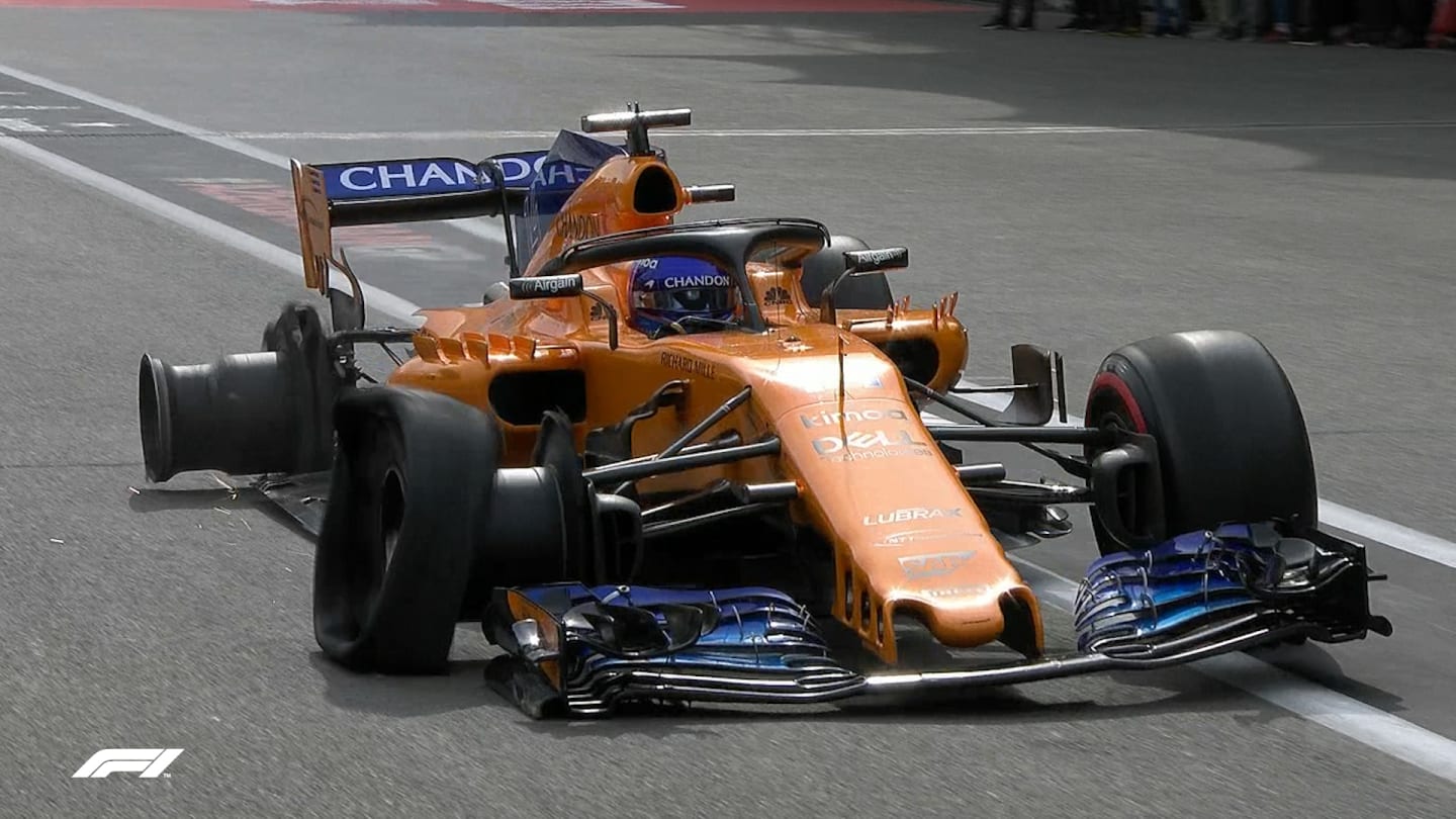 RACE: Alonso returns to pits on two