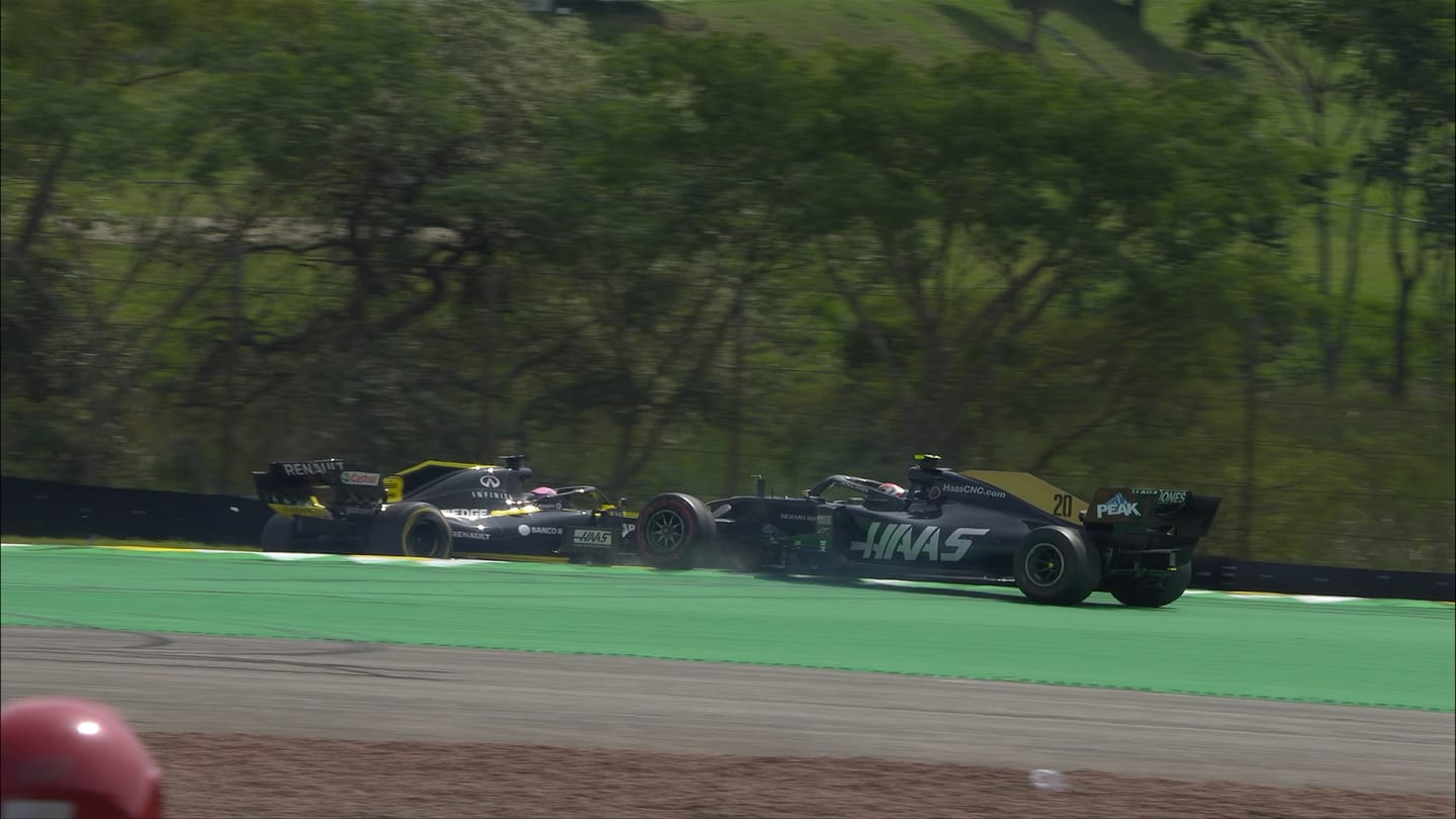BRAZILIAN GP: Magnussen spins after damaging Ricciardo contact