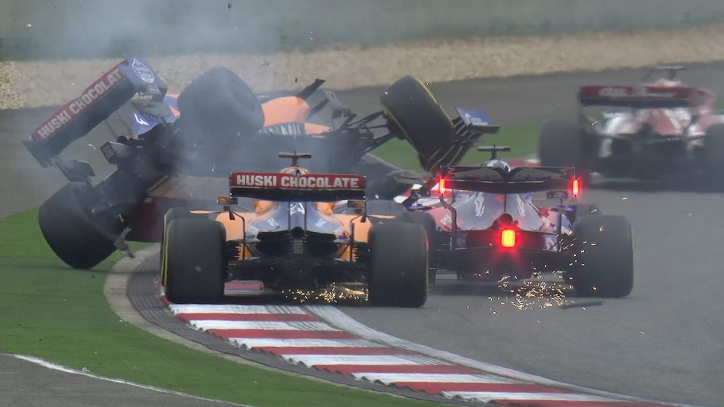 CHINESE GP: Kvyat tangles with McLarens on the opening lap