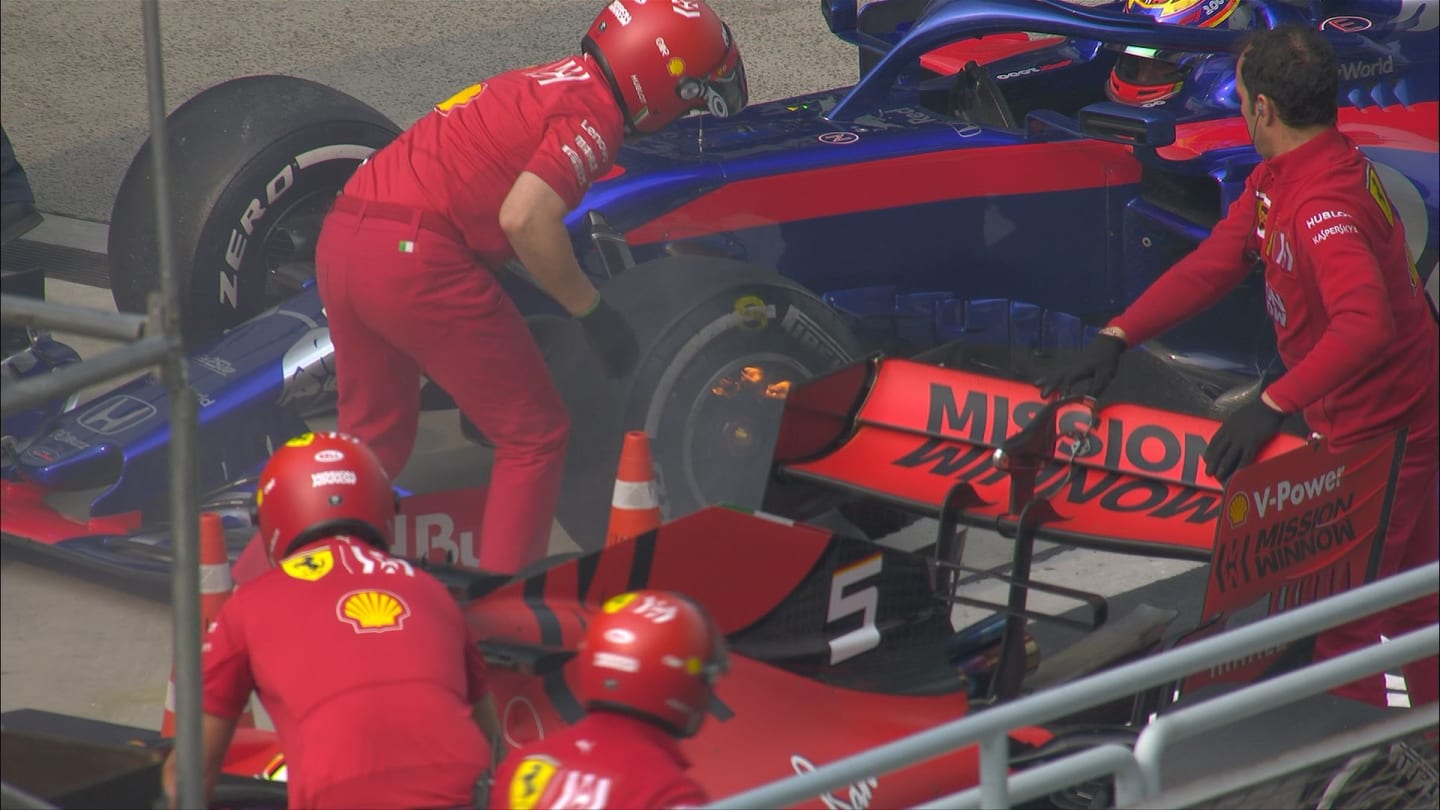 FP2: Ferrari mechanics rush to extinguish Albon brake fire